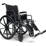 Everest & Jennings Advantage LX wheelchair with detachable desk arms and elevating legrests