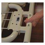 Joerns 42 inch hospital bed width extension being pinned onto the UltraCare XT sleep deck