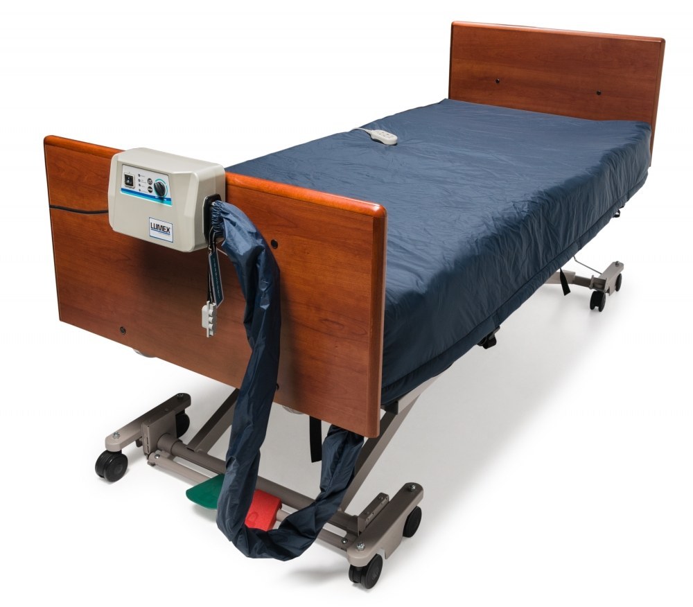 Lumex LS200 alternating pressure mattress with low air loss on a hospital bed with the pump on the footboard