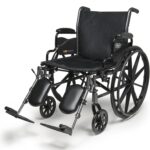 Everest & Jennings Traveler L3 Plus wheelchair with flip-back desk arms and swing-away footrests