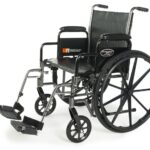 Everest & Jennings Traveler SE Plus wheelchair with detachable desk arms and swing-away footrests