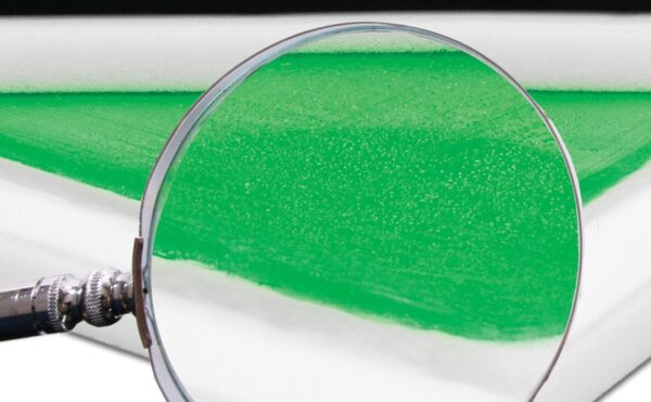 Wide wheelchair cushion gel layer shown under a magnifying glass