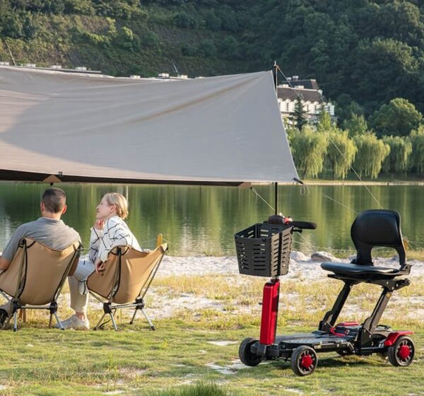 VOCIC D91 portable scooter with basket at a lakeside campsite