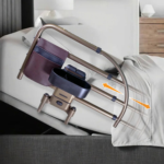Bed rail for seniors with extendable safety rail, EZ Click removable handle, organizer pouch, and adjustable bed compatibility for safer nighttime fall prevention