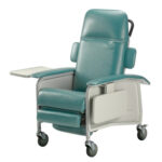 Invacare Clinical Dialysis Chair with 3 reclining positions, Trendelenburg support, dual trays, and fluid-resistant upholstery