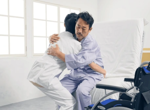 Patient transfer equipment including a hydraulic Hoyer lift, transfer chair, and stand assist device for safe mobility.