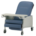 Invacare gerry chair three-position recliner in Blueridge with fold-under footrests, tray, and articulating headrest