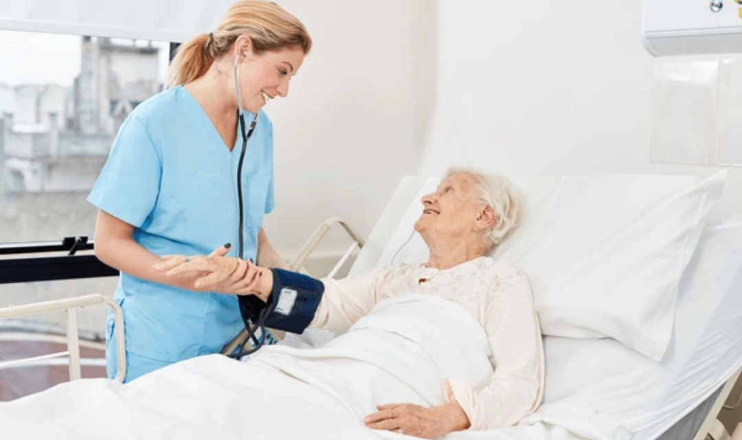 Elderly patient receiving compassionate care at home with hospital beds for home use