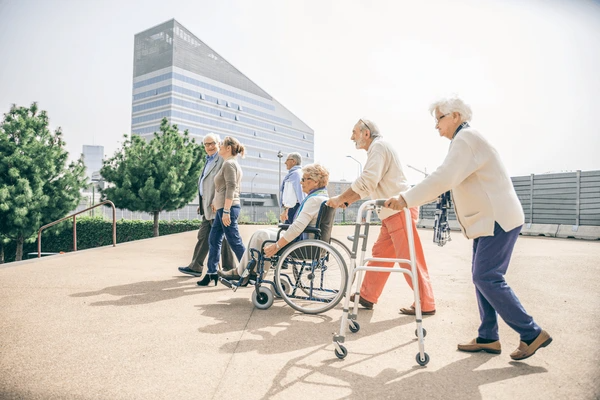 Elderly seniors using mobility aids for elderly support and independence