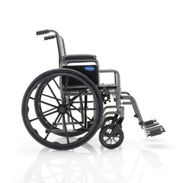 Lightweight standard wheelchair by Invacare with swing-away footrests and desk-length arms