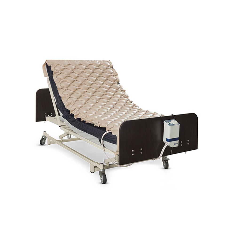 Alternating pressure pad and pump: Medacure Bubble Pad BP300 overlay on a mattress